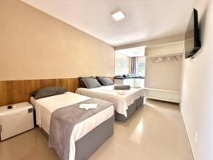 Your Home - Studios Boutique Hotel客房内的一张或多张床位