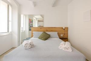 Кровать или кровати в номере ItalHouse exclusive apt in the center Riomaggiore