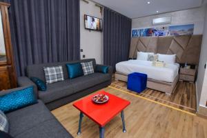 Postel nebo postele na pokoji v ubytování Hotel Dar Annasr
