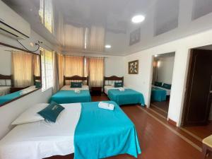 Hotel Mar Azul Neiva客房内的一张或多张床位