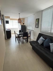Posezení v ubytování Apartamento a 5 min del Parque del café