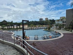 Bazén v ubytování Aqualand Resort nebo v jeho okolí