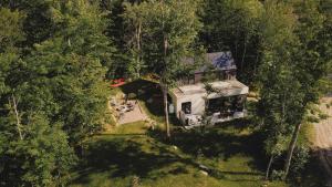 an overhead view of a house in the woods at SpaHaus #128 in Lac-Superieur