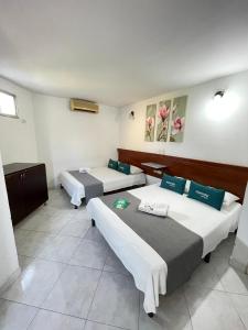 Hotel Mar Azul Neiva客房内的一张或多张床位