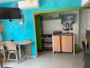 Kuchyň nebo kuchyňský kout v ubytování Apartaestudios Ofir + 11 fotografií