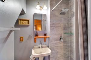 a bathroom with a sink and a shower at Cabin with Boat Launch and Pool Access in Okeechobee in Okeechobee