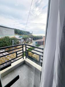 Balkón nebo terasa v ubytování Happy Bun Hotel Da Lat + 37 fotografií