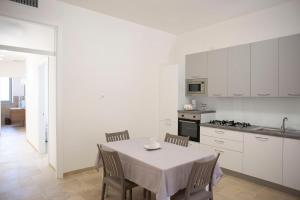 Kuchyň nebo kuchyňský kout v ubytování Tenuta Masiedd + 39 fotografií