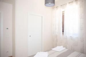 Postel nebo postele na pokoji v ubytování Tenuta Masiedd