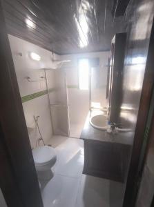 Et badeværelse på Casa Branca 39 - Pontal do Atalaia + 7 billeder