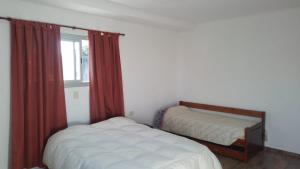 Ένα ή περισσότερα κρεβάτια σε δωμάτιο στο La Casa de Sole +13 φωτογραφίες