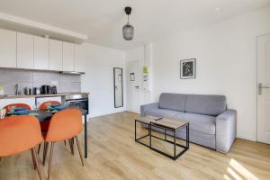 Kuchyňa alebo kuchynka v ubytovaní Résidence Paris Ivry House
