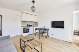 Kuchyňa alebo kuchynka v ubytovaní Résidence Paris Ivry House