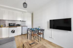 Kuchyňa alebo kuchynka v ubytovaní Résidence Paris Ivry House