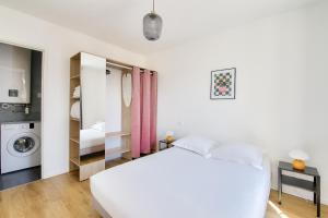 Posteľ alebo postele v izbe v ubytovaní Résidence Paris Ivry House