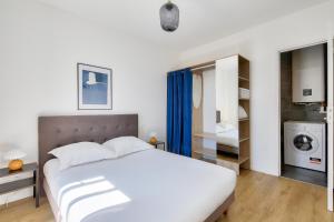 Posteľ alebo postele v izbe v ubytovaní Résidence Paris Ivry House