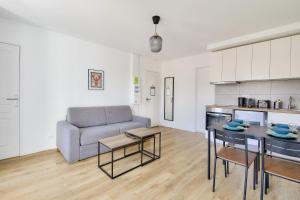 Kuchyňa alebo kuchynka v ubytovaní Résidence Paris Ivry House