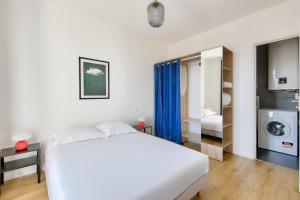 Posteľ alebo postele v izbe v ubytovaní Résidence Paris Ivry House