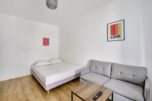 Posteľ alebo postele v izbe v ubytovaní Résidence Paris Ivry House