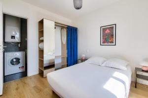 Posteľ alebo postele v izbe v ubytovaní Résidence Paris Ivry House