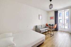 Posteľ alebo postele v izbe v ubytovaní Résidence Paris Ivry House