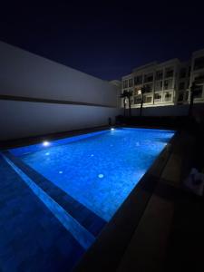 Swimmingpoolen hos eller tæt på Cosy appart hotel Bouznika + 2 billeder