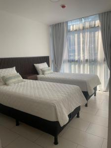 Katil atau katil-katil dalam bilik di Moderno apart en Col Escalón,vista,piscina,gimnasio
