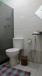 Kylpyhuone majoituspaikassa Pousada Zimbauê