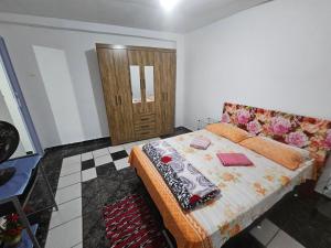 Posteľ alebo postele v izbe v ubytovaní Casa Completa com Rede próxima ao Aeroporto de Guarulhos