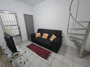 Posedenie v ubytovaní Casa Completa com Rede próxima ao Aeroporto de Guarulhos
