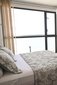 Cama o camas de una habitación en Murano Centro1 26floor,rooftop,infinity pool & views by IMZ