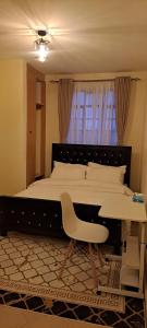Katil atau katil-katil dalam bilik di Xalleria Stay - Affordable Cozy Studio, Kitisuru