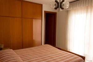 Un pat sau paturi într-o cameră la Albergo Speranza