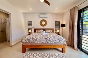Villa Moea private pool confort & serenity in Pirae - AC- Wifi - 3 bdr客房内的一张或多张床位