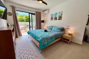 Villa Moea private pool confort & serenity in Pirae - AC- Wifi - 3 bdr客房内的一张或多张床位