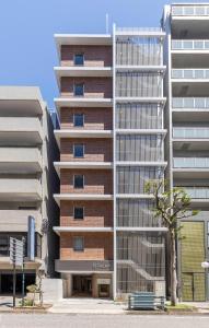 an external view of a tall building at Tabi and Nagasaki Grand Open!! 2025 in May in Nagasaki +50 photos