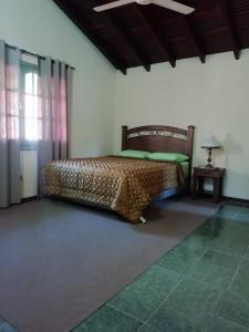 a bedroom with a cheetah bed in a room at Spacious apartment on the second floor in Asuncion