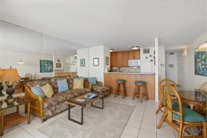 a living room with a couch and a table at SUGAR BEACH RESORT, #430^ condo in Kihei