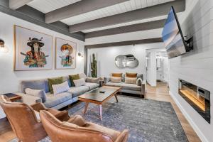 a living room with a couch and a fireplace at Luxurious 7BR Walk 2 Beach and Bus Stop in Carnelian Bay