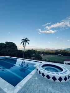 Bazén v ubytování Finca Hotel Bella Vista nebo v jeho okolí