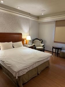 Voodi või voodid majutusasutuse Erin Hotel toas