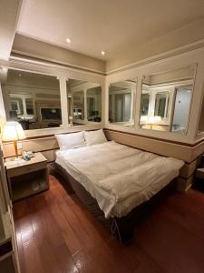 Voodi või voodid majutusasutuse Erin Hotel toas