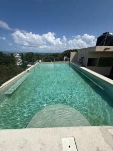 Πισίνα στο ή κοντά στο Torre 70, departamento 12