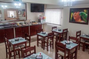 Kuchyň nebo kuchyňský kout v ubytování Hotel Rafeli