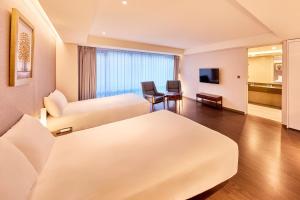 TV a/nebo společenská místnost v ubytování Hotel Thomas Myeongdong