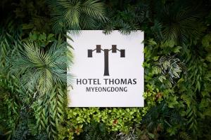 Un certificat, premiu, logo sau alt document afișat la Hotel Thomas Myeongdong