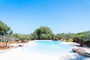 Bazén v ubytování Orosei RE - Il Paradiso degli Ulivi con PISCINA e vista mare nebo v jeho okolí