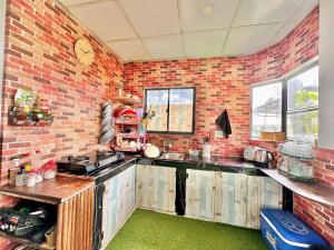 O bucătărie sau chicinetă la Như Mây Homestay