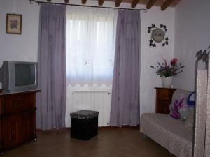 TV a/nebo společenská místnost v ubytování Hermitage Holidays