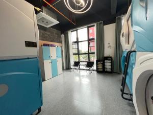 Dapur atau dapur kecil di Yunduo Jinxiu Space Capsule Hotel & Kunming South Railway Station Branch +11 gambar